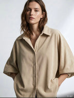 Poncho Cordbluse mit raffbaren Ärmeln
