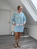 Lochstrick-Poncho mit Dreiviertelarm