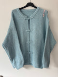 Strickweste im Military Style