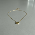 Goldene Edelstahlkette mit gewelltem Anhänger